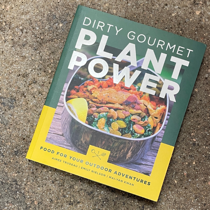 The cookbook "Dirty Gourmet Plant Power" by Aimee Trudeau, Emily Nielson, and Mai-Yan Kwan.