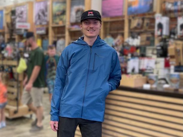 One of Mountain Chalet's crew wearing Patagonia's Storm 10 Jacket in the shop.